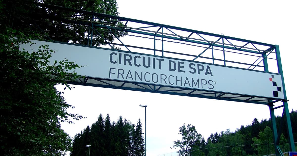 The Circuit de Spa-Francorchamps entrance gantry among the trees of the Ardennes