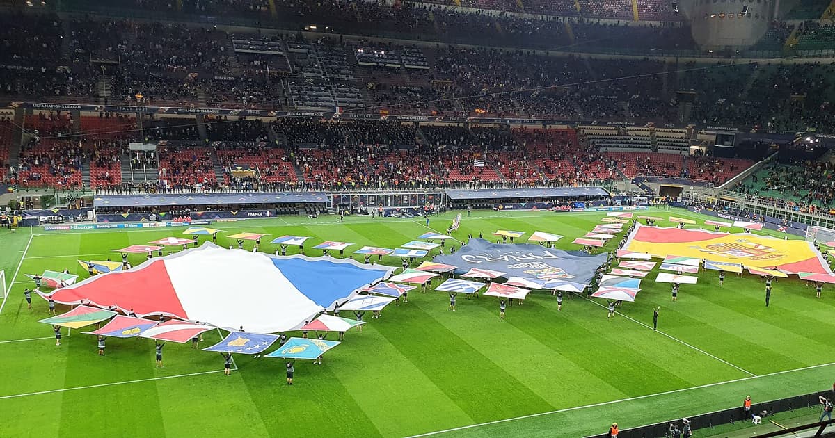 Giant France and Spain flags displayed on the pitch before the two sides met in the UEFA Nations League final